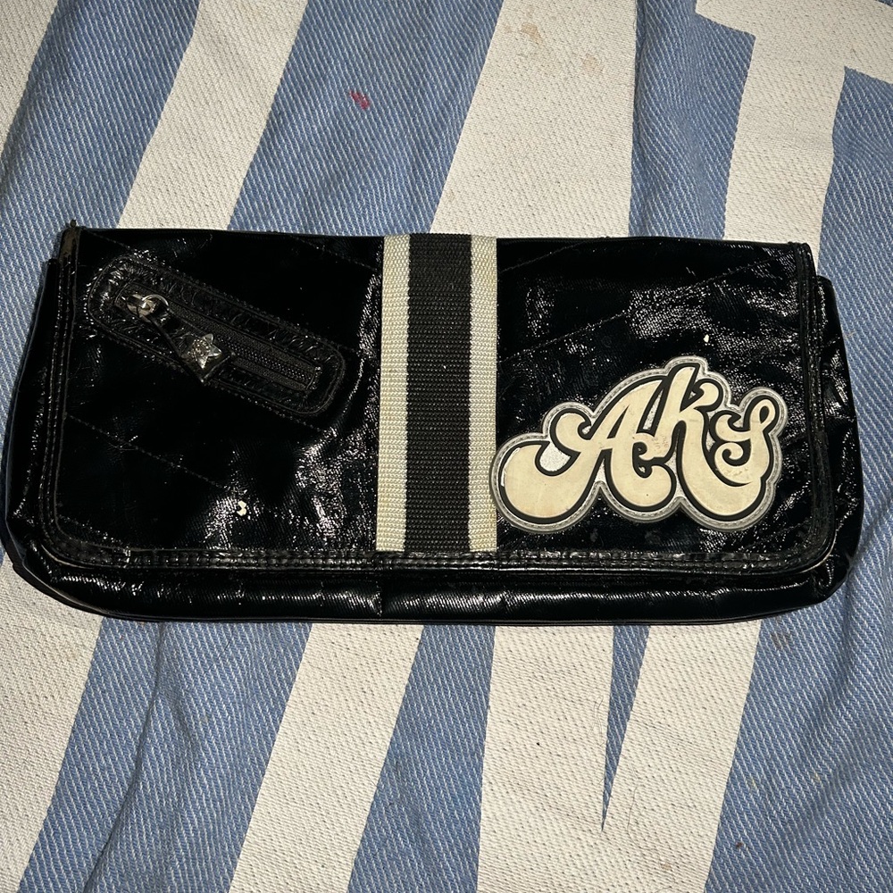 akademiks clutch bag